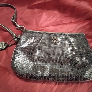 Coach Silver Sequin Wristlet. Lavender Interior. Excellent Used Condition!!!